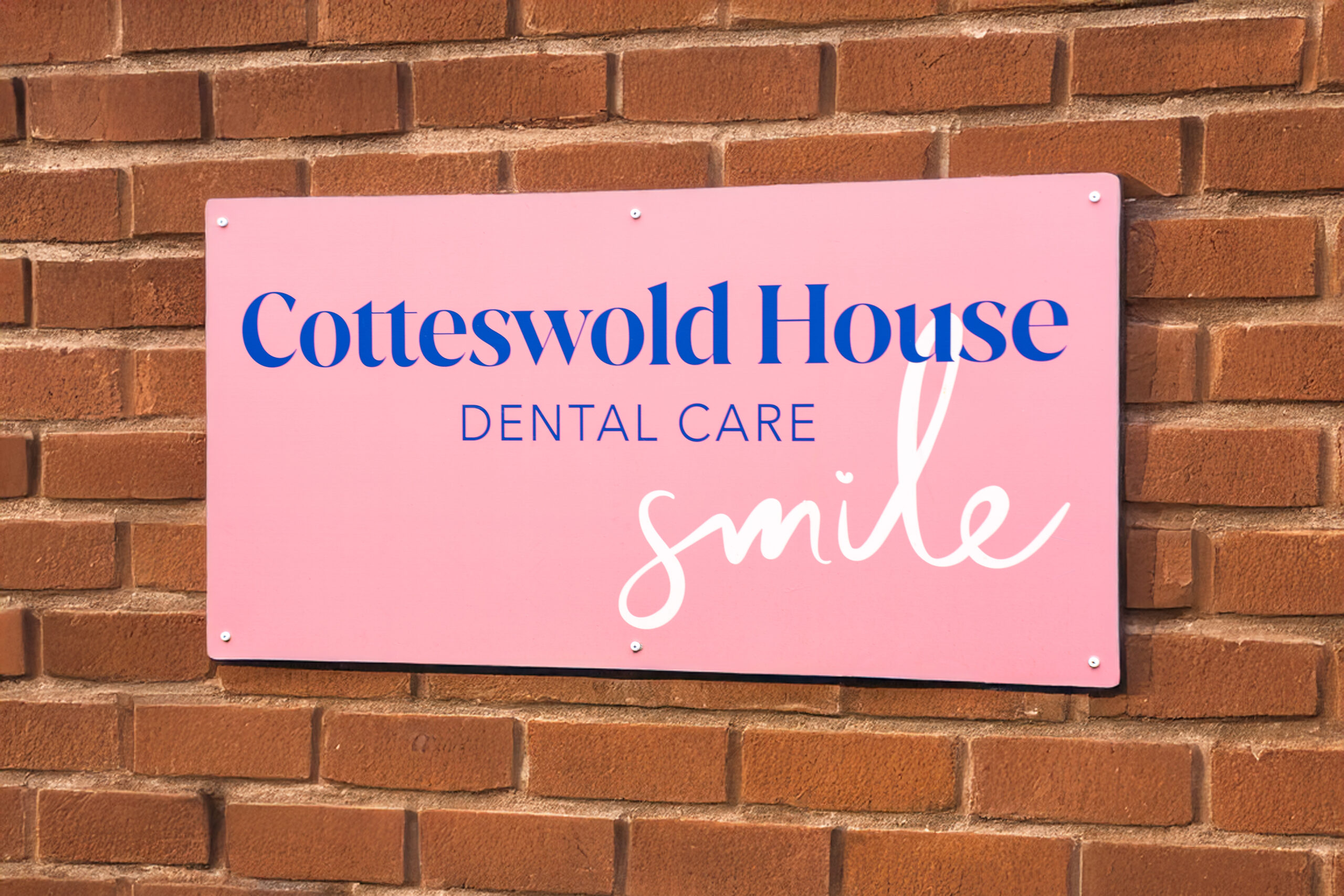 sign saying Cotteswold House Dental Care
